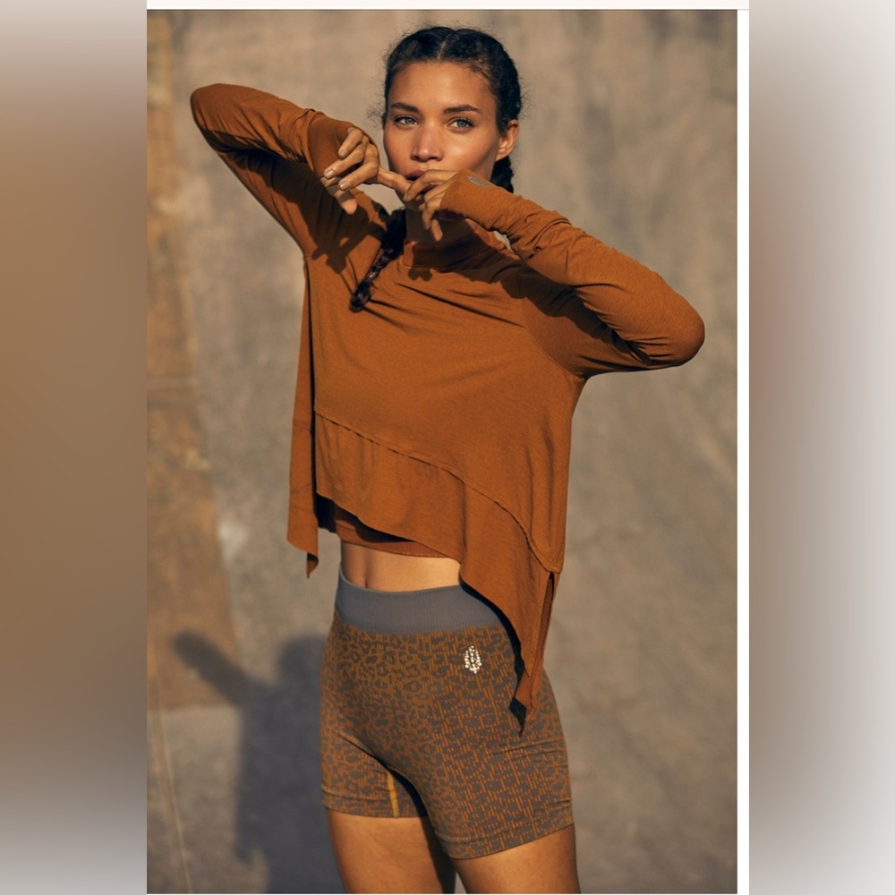 Free people tempo long sleeve. New with tags. Size small.